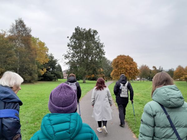 Group walking in Chances Park